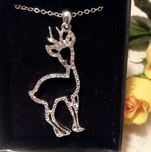 Avon Jewelry - Reindeer  pendant Silvertone